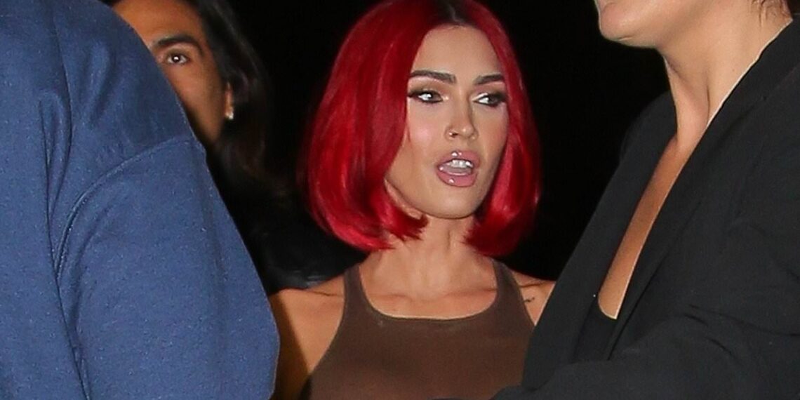 Megan Fox goes braless under a sheer tank top at reading for her poetry book Pretty Boys Are Poisonous in NYC after revealing she suffered a miscarriage with fiance Machine Gun Kelly