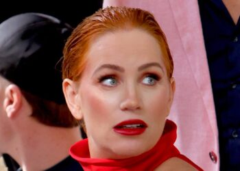 Married At First Sight star Jules Robinson shows off her growing baby bump in 98 satin designer set at launch for her new book