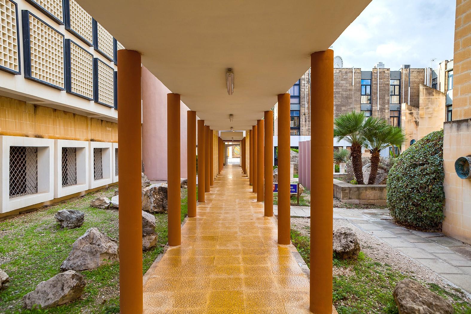 Heywood espouses, in this book, a social justice education and community engagement by universities. Pictured is a path within the University of Malta. Photo: Shutterstock.com Heywood espouses, in this book, a social justice education and community engagement by universities. Pictured is a path within the University of Malta. Photo: Shutterstock.com