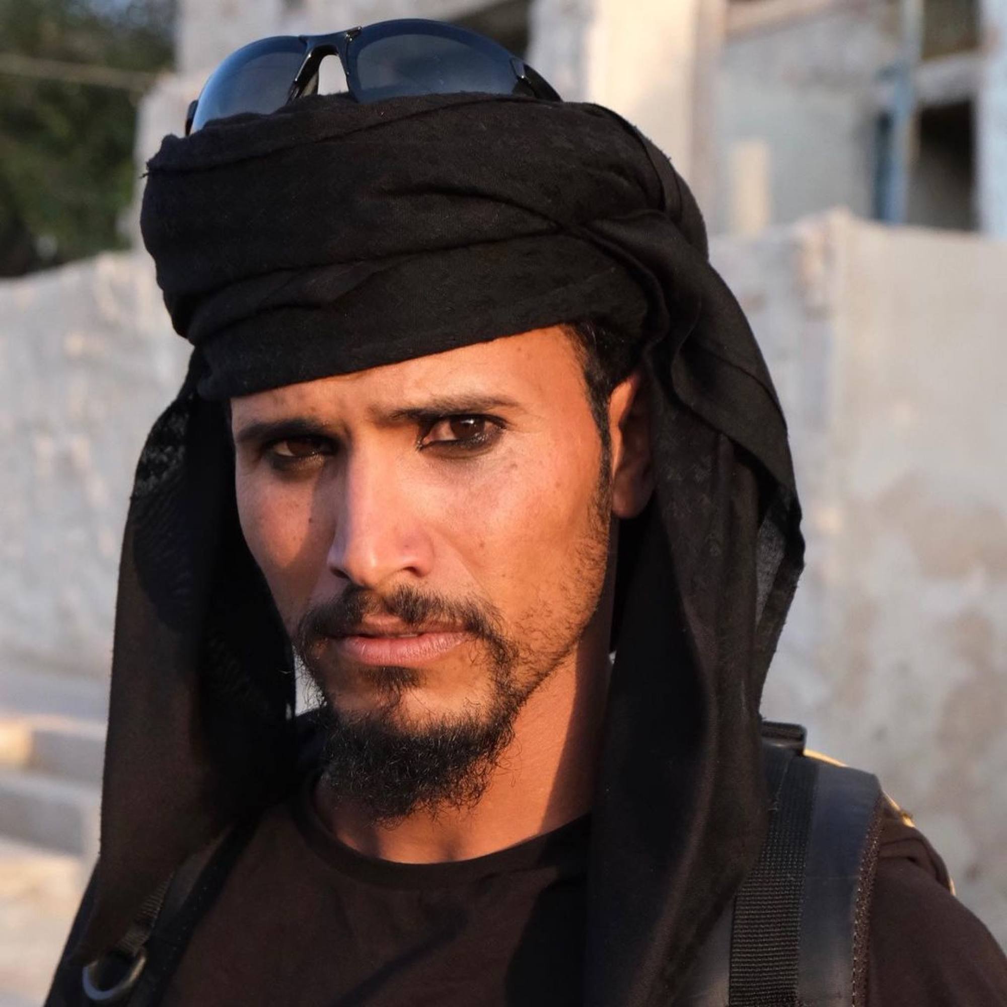 A Bedouin man wearing eyeliner