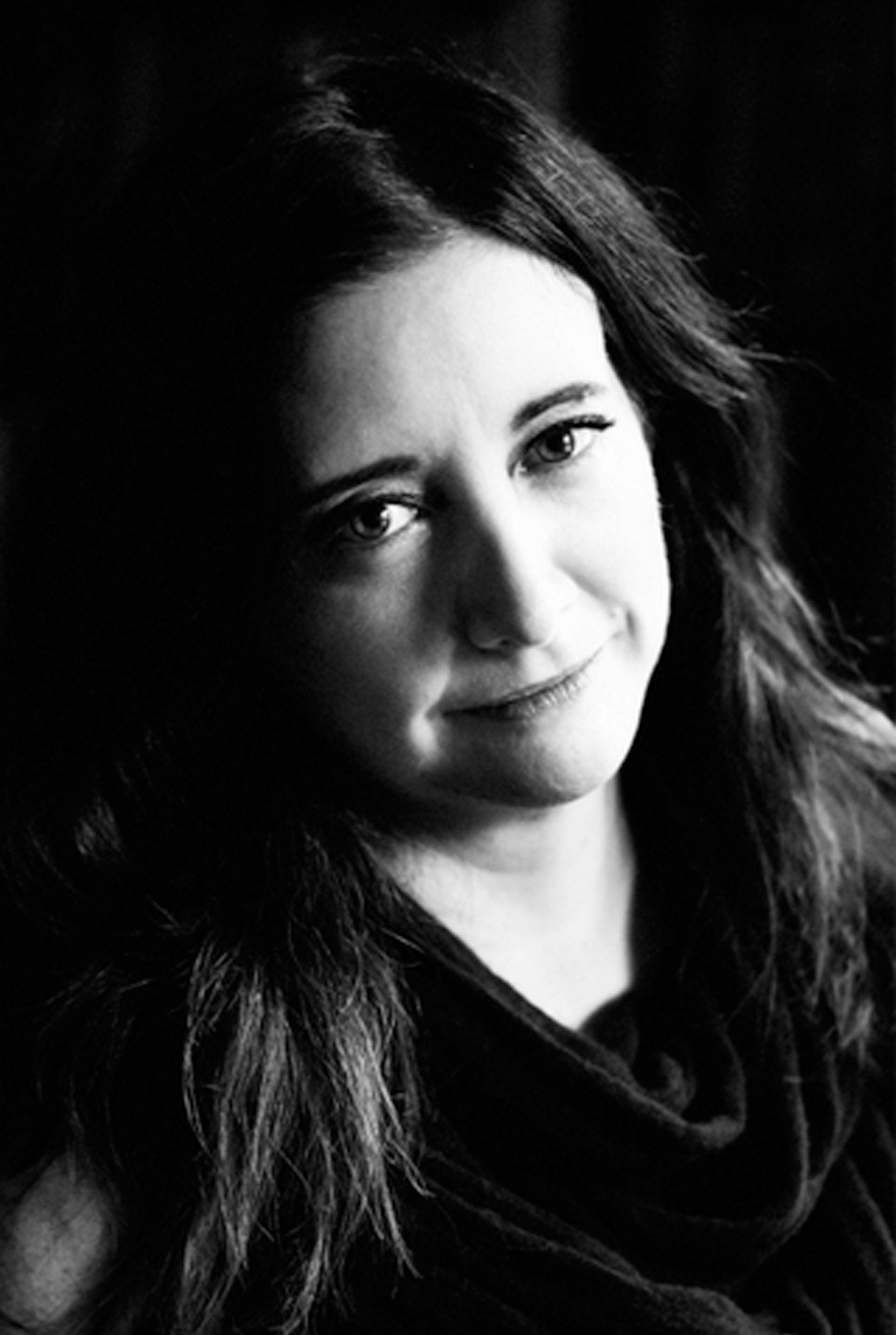 The author's book jacket photo is black and white and she looks contemplative.