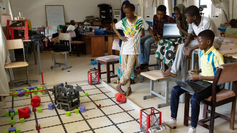 Children work on building robots at the RobotsMali center in Bamako.