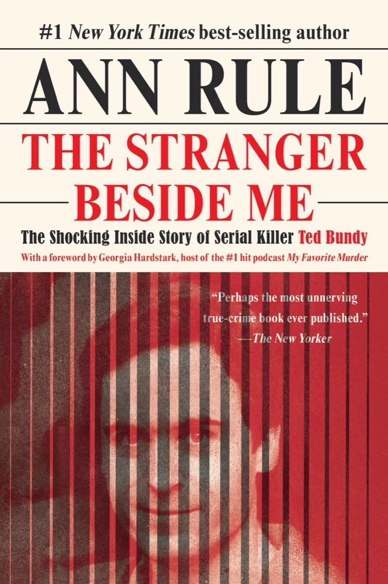 A book cover with a man in shades of red behind bars