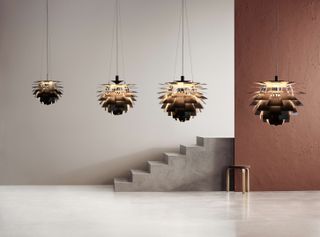 Louis Poulsen campaign image from 2020, showing the newly launched black version of the PH Artichoke in four sizes.
