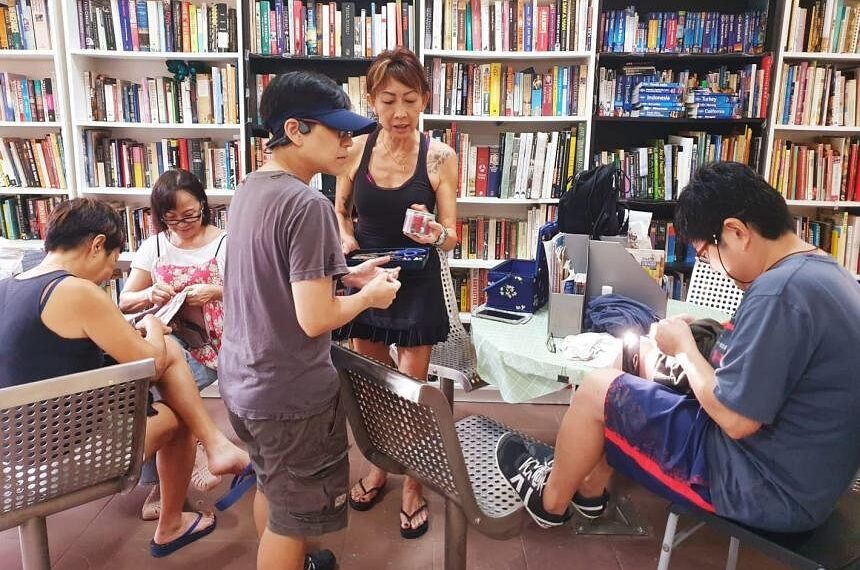 Want to read books and make friends? Head for libraries set up by residents in HDB void decks