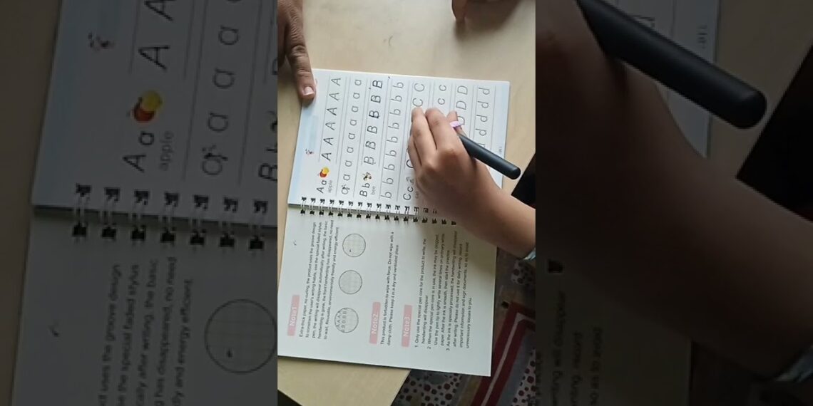 Writing on Sank magic practice copybook ( it will erase automatically after some time) ☺☺